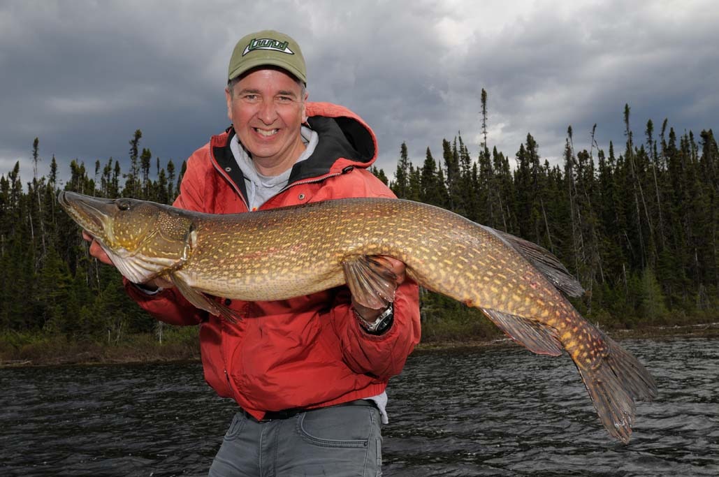 Fishing Northern pike at Association de Pourvoirie du Lac Mistassini, Eeyou Istchee Baie-James, Quebec