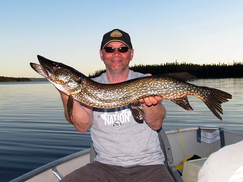Fishing Northern pike at Pourvoirie Baie de l'Est, Mauricie, Quebec
