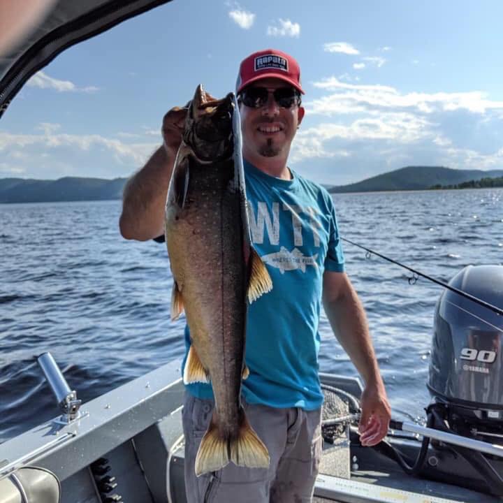 Angler with a beautiful trout at Pourvoirie Lacs des Sables et Paradis, Côte-Nord, Quebec